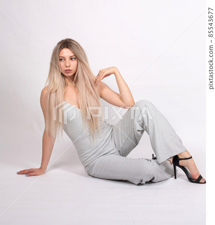 Young white european woman on grey 85543677