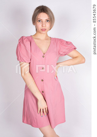 Young white european woman on grey Young white european woman on grey 85543679
