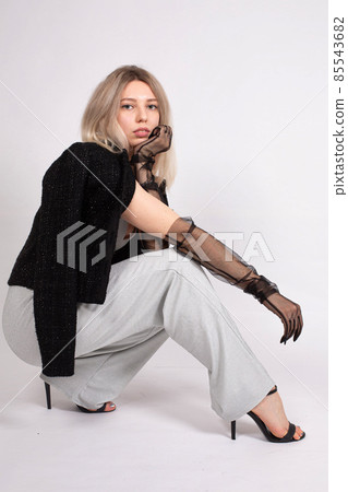 Young white european woman on grey Young white european woman on grey 85543682