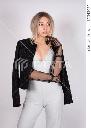 Young white european woman on grey 85543683