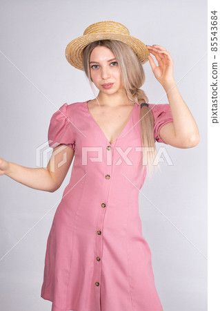 Young white european woman on grey 85543684