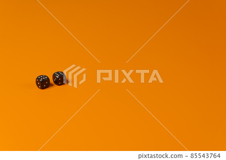 Lucky chance on game dice two sixes on orange background 85543764