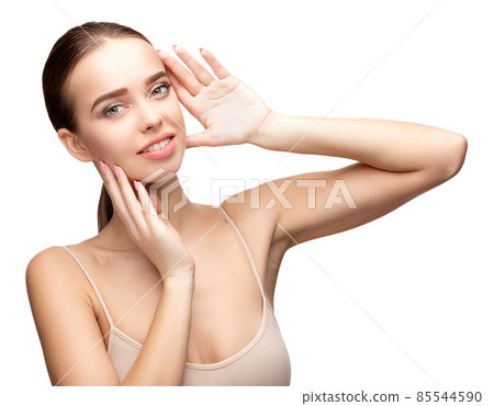 Beautiful Young Woman with Clean Fresh Skin isolated on white background Beautiful Young Woman with Clean Fresh Skin isolated on white background 85544590