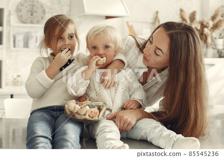 Family cook the dough for cookies 85545236