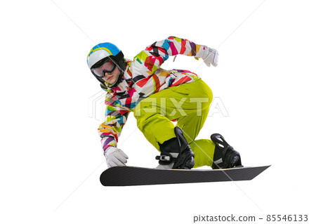 Close-up young woman in bright sportswear, goggles and helmet snowboarding isolated on white studio background. Concept of winter sports 85546133