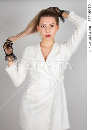 Young white european woman on grey 85546610