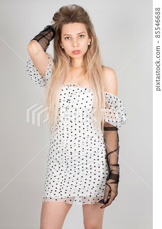 Young white european woman on grey Young white european woman on grey 85546688