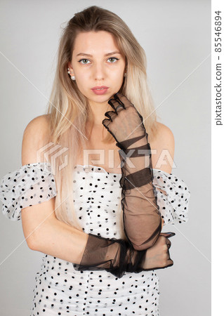 Young white european woman on grey 85546894