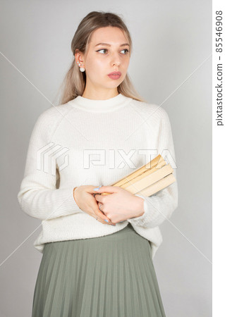 Young white european woman on grey 85546908