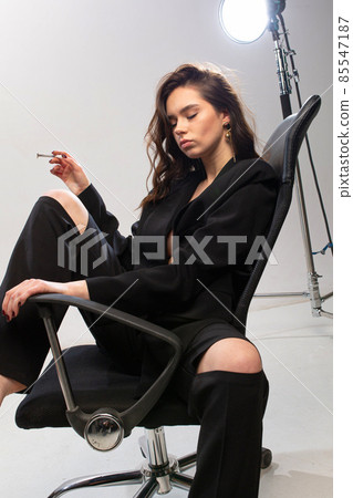 Young white european woman in office Young white european woman in office 85547187