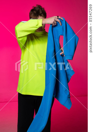 Young white european man isolated on pink 85547269