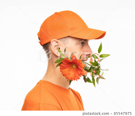 Young man with flower on white Young man with flower on white 85547975