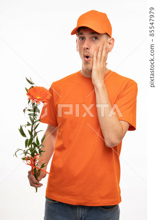 Young man with flower on white Young man with flower on white 85547979