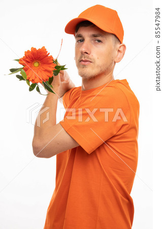 Young man with flower on white Young man with flower on white 85547984