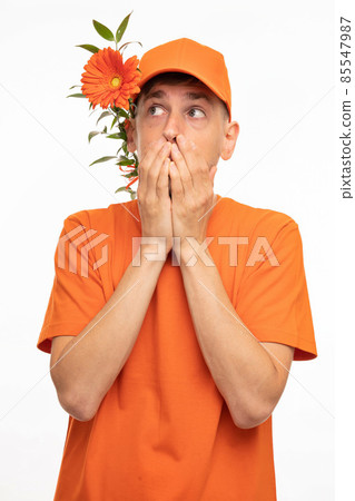 Young man with flower on white Young man with flower on white 85547987