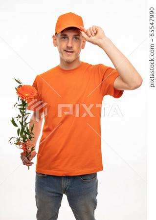 Young man with flower on white Young man with flower on white 85547990