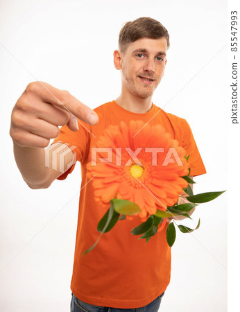 Young man with flower on white Young man with flower on white 85547993