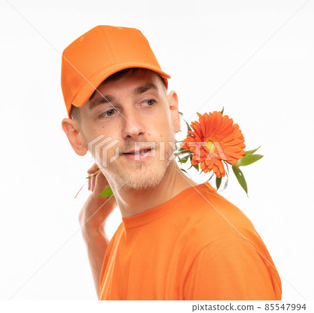 Young man with flower on white Young man with flower on white 85547994