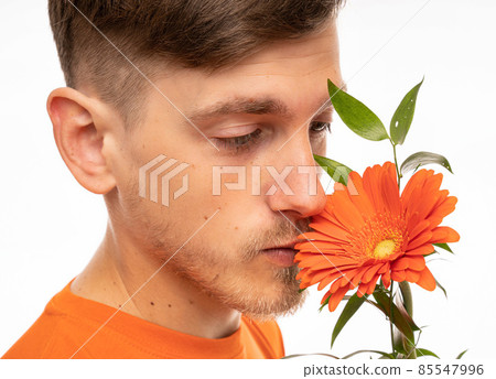 Young man with flower on white 85547996
