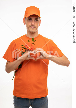 Young man with flower on white Young man with flower on white 85548058