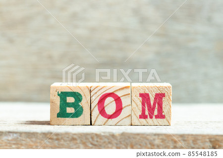 Alphabet letter block in word BOM (abbreviation of bill of materials) on wood background Alphabet letter block in word BOM (abbreviation of bill of materials) on wood background 85548185