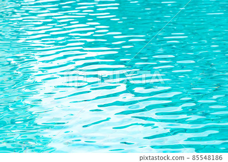Ripple Water in swimming pool with blue tile floor background Ripple Water in swimming pool with blue tile floor background 85548186