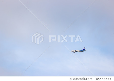 ANA Boeing 787, a passenger plane that continues to rise after taking off from Osaka Airport 85548353