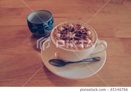 A delicious cup of cafe mocha or mocaccino to warm the cold winter morning A delicious cup of cafe mocha or mocaccino to warm the cold winter morning 85548766