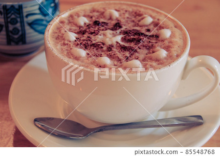 A delicious cup of cafe mocha or mocaccino to warm the cold winter morning A delicious cup of cafe mocha or mocaccino to warm the cold winter morning 85548768