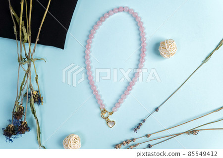 Genuine Natural Pink Quartz Untreated Natural Real Gemstone Beads close up. Flat lay Genuine Natural Pink Quartz Untreated Natural Real Gemstone Beads close up. Flat lay 85549412