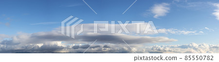 View of Cloudscape during a cloudy blue sky sunny day. 85550782