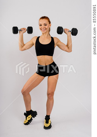 Female in studio, beautiful fitness sport woman's body is in underwear Female in studio, beautiful fitness sport woman's body is in underwear 85550891