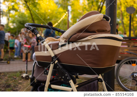Empty baby stroller for boys in the park. 85554108