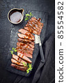Traditional American barbecue dry aged flank steak 85554582