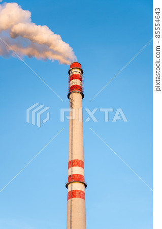Industrial chimney smoking on sunny winter day Industrial chimney smoking on sunny winter day 85554643