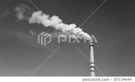 Industrial chimney smoking on sunny winter day 85554644