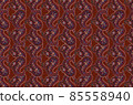 Burgundy background from an embroidered paisley pattern of curved twigs with flowers, leaves and buds 85558940