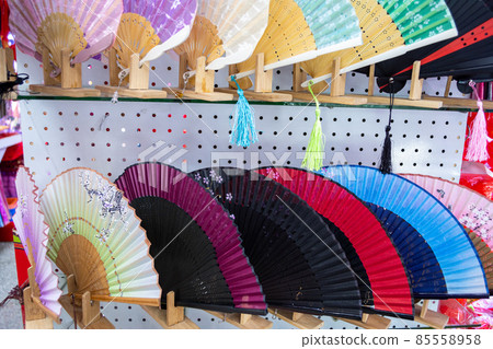 Traditional Chinese silk and bamboo folding hand fans, souvenirs from Beijing, China Traditional Chinese silk and bamboo folding hand fans, souvenirs from Beijing, China 85558958
