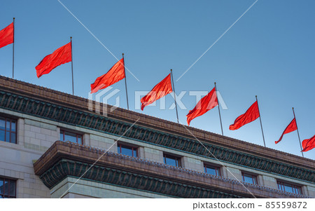 Red banners atop the National People`s Congress in Beijing, China Red banners atop the National People`s Congress in Beijing, China 85559872