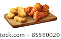 Fried Nucket and Fried wing chicken on wood butcher isolated white background 85560020
