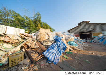 Stack Of Different Types Of Large Garbage Pile, Plastic Bags, And Trash In  Industrial Factory In Environmental Pollution. Waste Disposal In Dumping  Site In Urban City. Stock Photo, Picture and Royalty Free