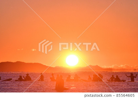 First sunrise surfing (silhouette) First sunrise surfing (silhouette) 85564605