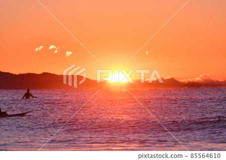 First sunrise surfing (silhouette) First sunrise surfing (silhouette) 85564610