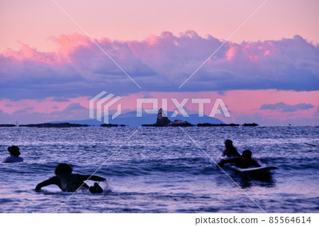 First sunrise surfing (silhouette) First sunrise surfing (silhouette) 85564614