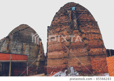 The famous centenarian traditional kilns for manufacturing handmade bricks in Vinh Long Province of Mekong Delta, Vietnam The famous centenarian traditional kilns for manufacturing handmade bricks in Vinh Long Province of Mekong Delta, Vietnam 85566283