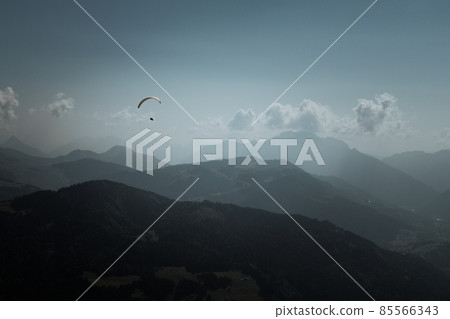 paragliding flight in the mountains. Le Grand-Bornand, France 85566343