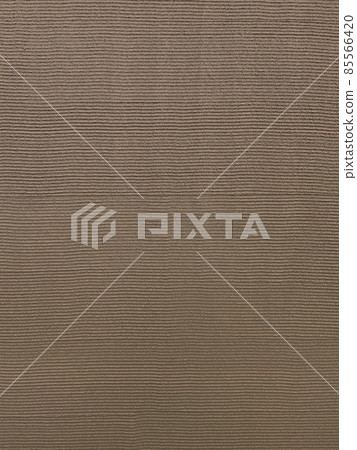 Vertical background image of gray-brown plaster wall finished by combing 85566420