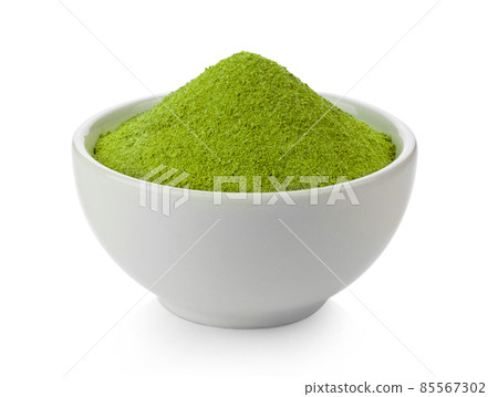 instant matcha green tea in ceramic bowl isolated on white 85567302