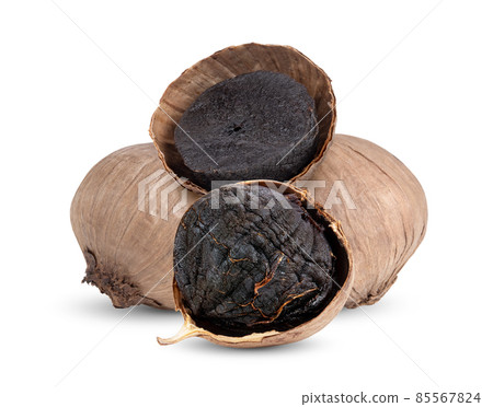 Black garlic bulbs on white background Black garlic bulbs on white background 85567824