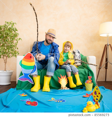 Dad and son enjoy a fishing trip 85569273